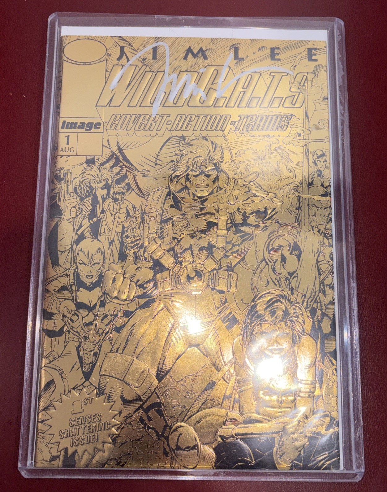 WildC.A.T.S Covert Action Team #1 Embossed Gold Edition signed by Jim Lee
