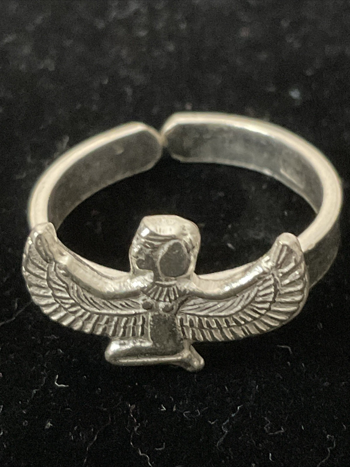 An elegant and modern silver ring featuring the goddess, Isis. Adjustable