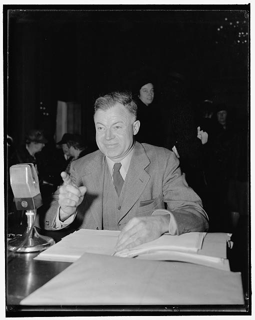 Photo:1939 1940 Man at Microphone Desk Suit Press Photo