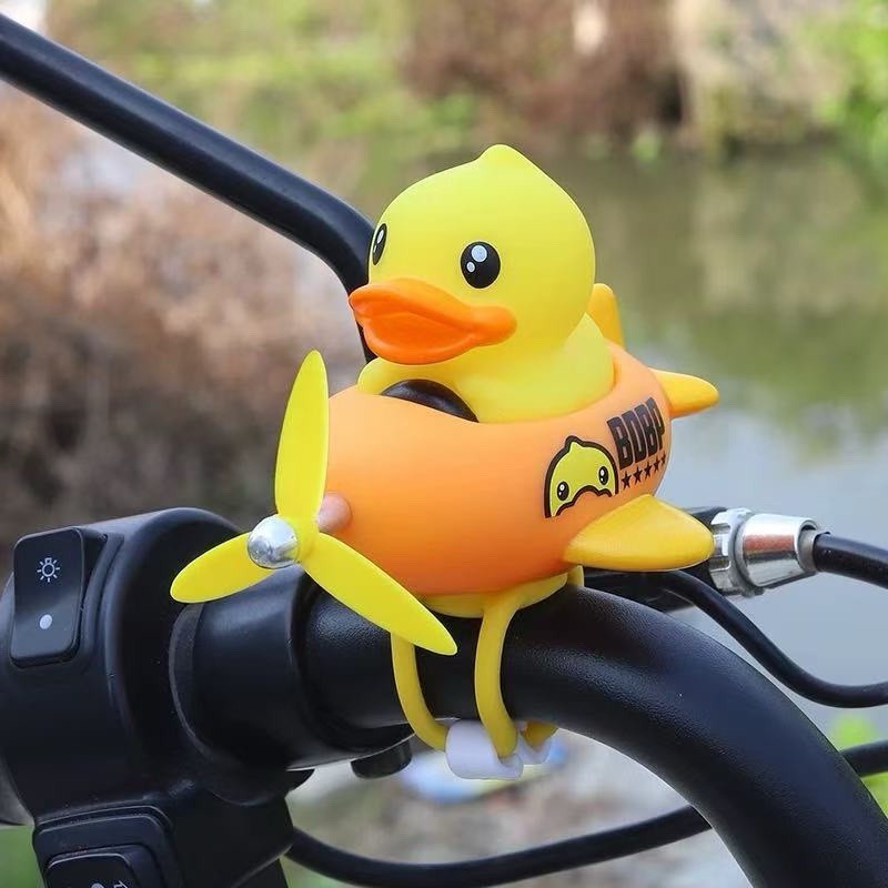 Cute yellow duck bike bell with propeller, perfect for adding fun to kids ride