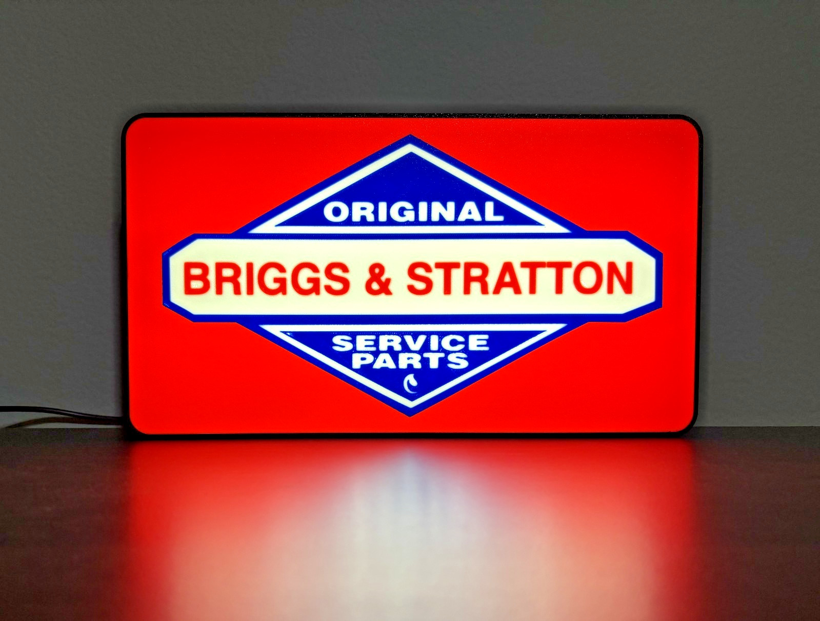 Lighted Briggs and Stratton Sign