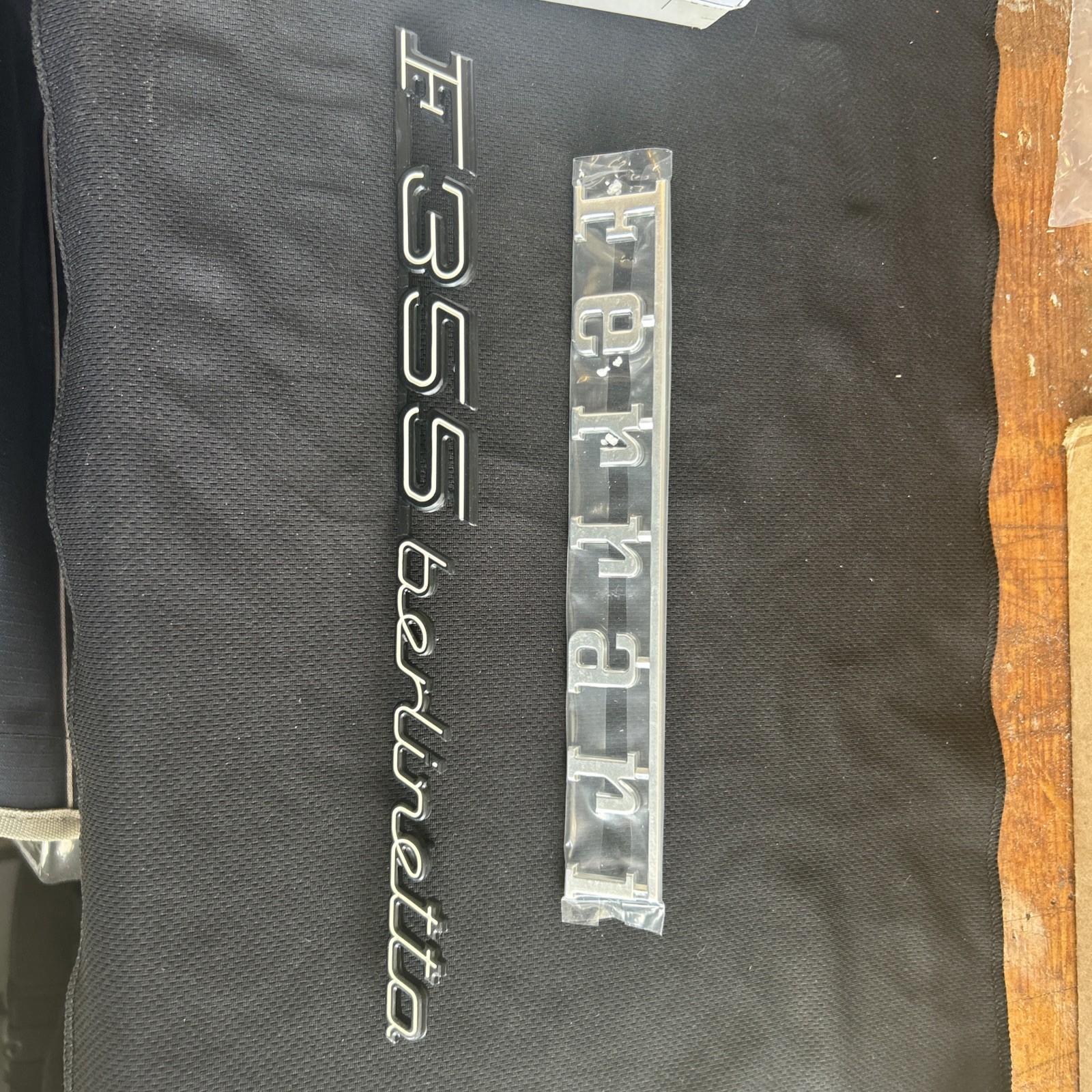 Unused, genuine Ferrari F355 Berlinetta emblem badge along with Ferrari badge ￼