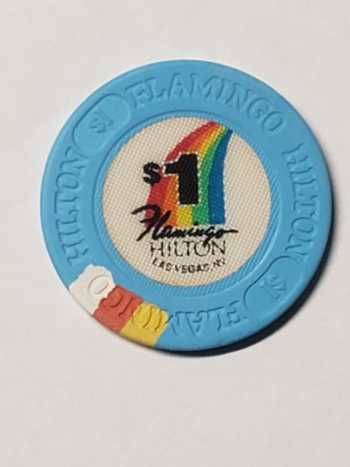 1.00 Chip from the FLAMINGO Hilton Casino Las Vegas Nevada 
