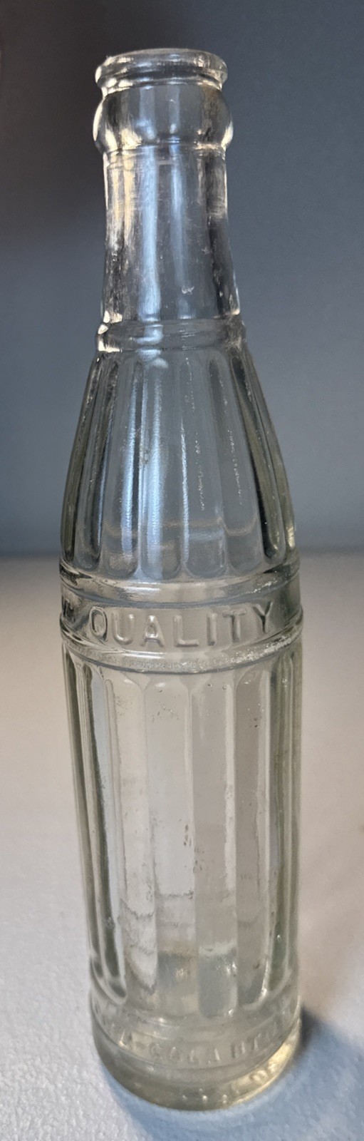 Antique Coca-Cola Bottling Co Quality Beverage Embossed Bottle
