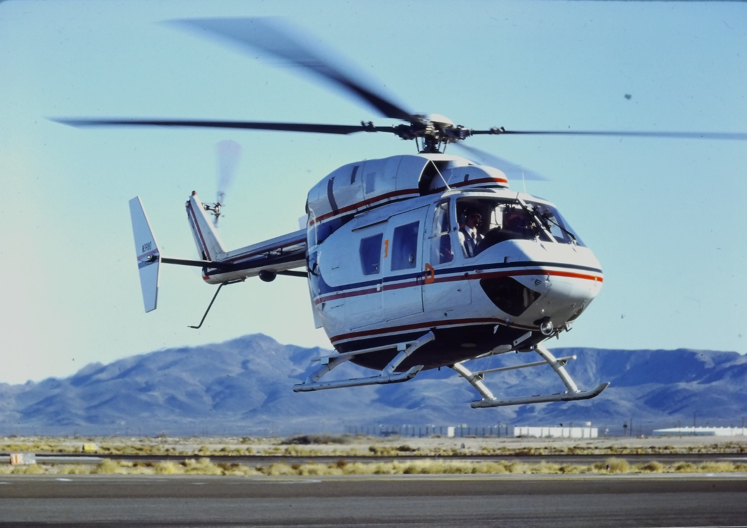 1980s MBB Kawasaki BK 117 Helicopter In Flight Over Desert 35mm Slide