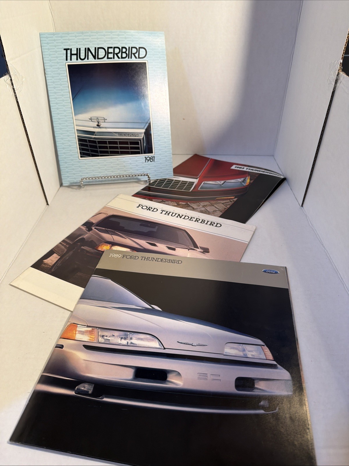 4 Vintage original Ford Thunderbird dealer sales brochure lot 1981 to 1989 OEM