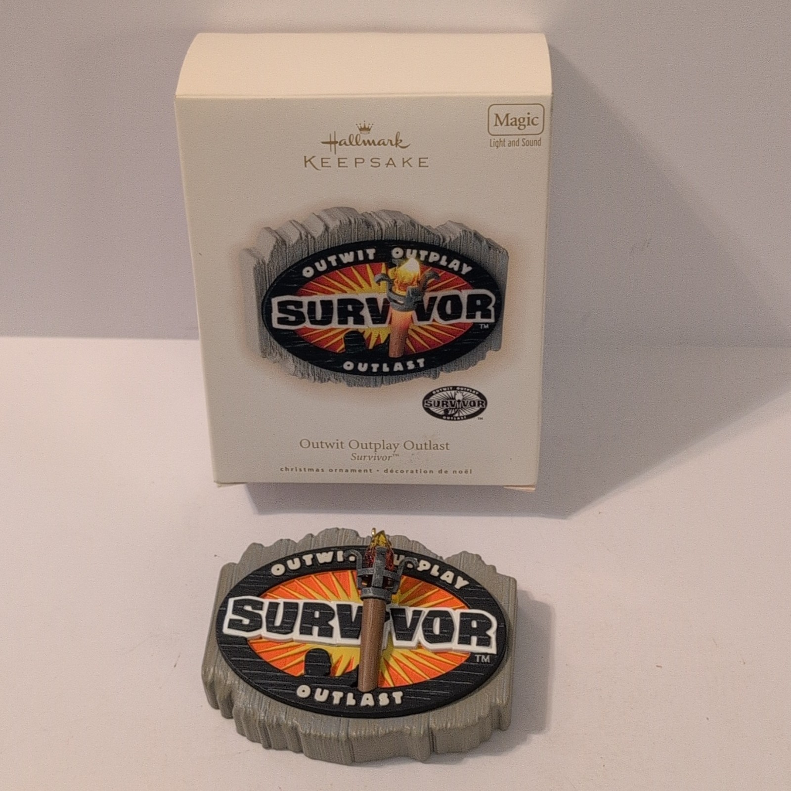 Hallmark Keepsake 2009 Survivor “Outwit Outplay Outlast” Magic Ornament