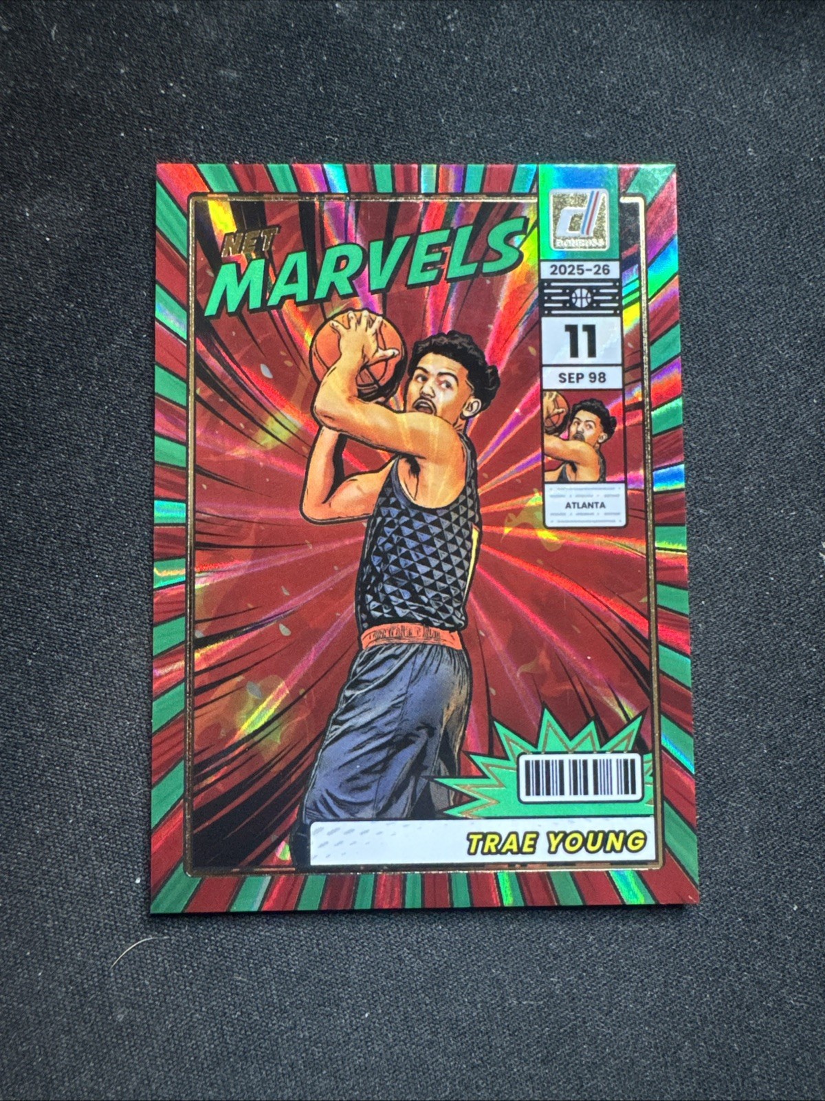 2025 Panini Donruss Basketball Net Marvels Insert Trae Young Green Laser