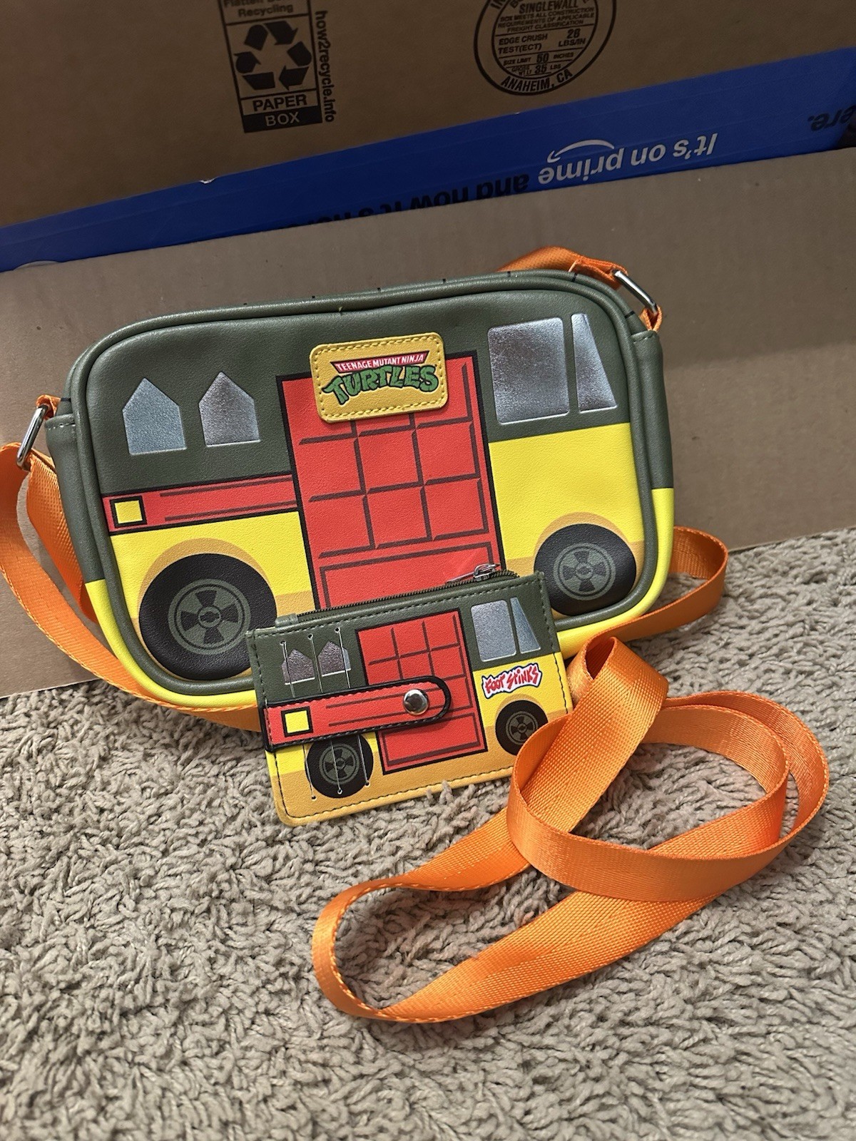 Nickelodeon Teenage Mutant Ninja Turtles Crossbody Bag with matching wallet.