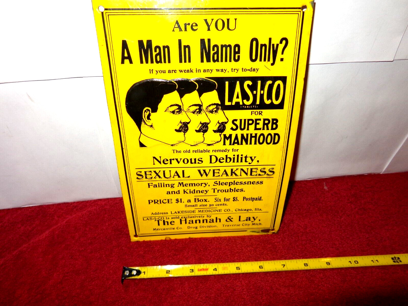 LAS-I-CO TABLETS FOR SUPERB MANHOOD ADV. SIGN EMBOSSED TIN METAL TACKER  - Z 470