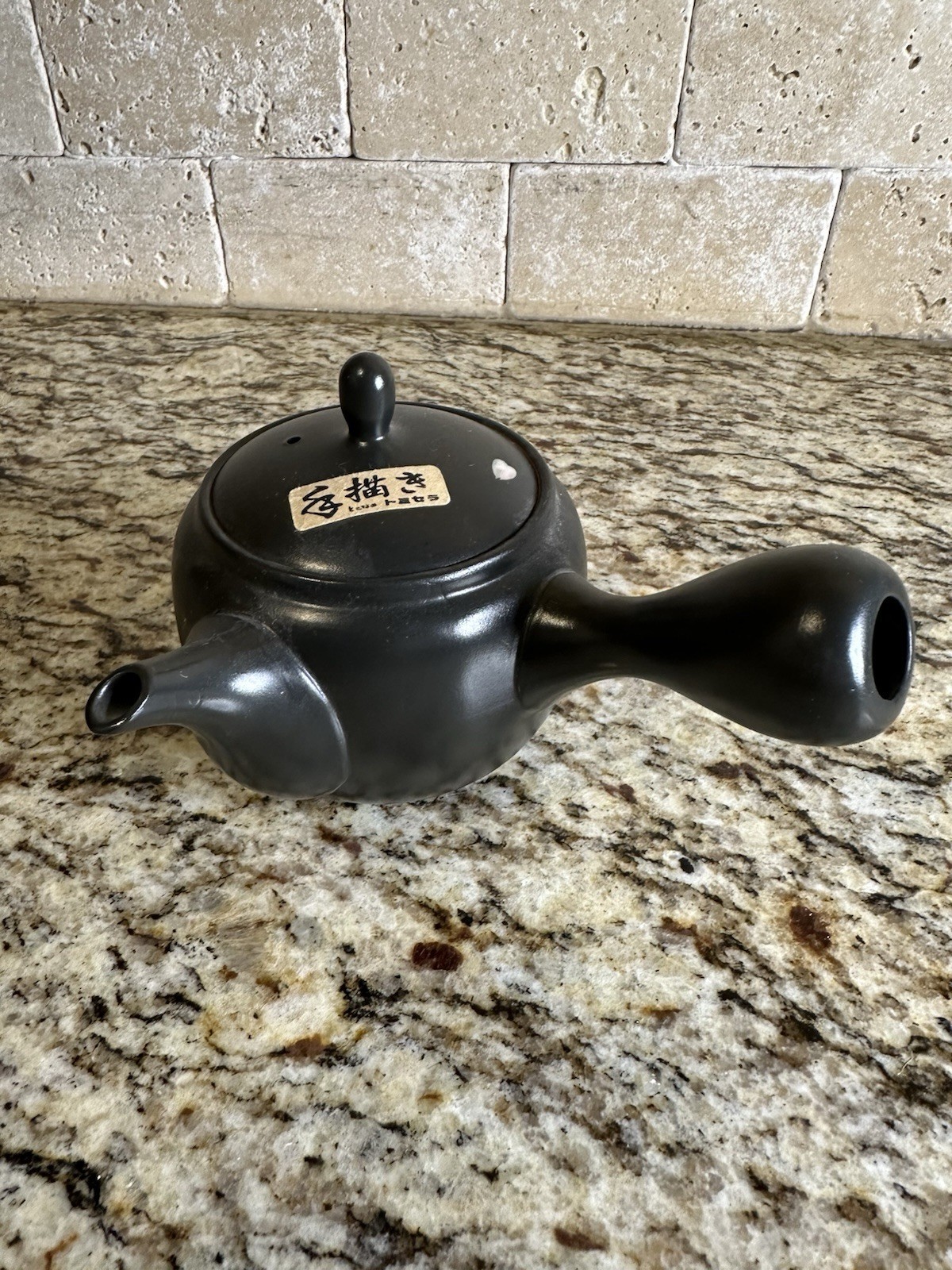 traditional black Japanese side-handled teapot