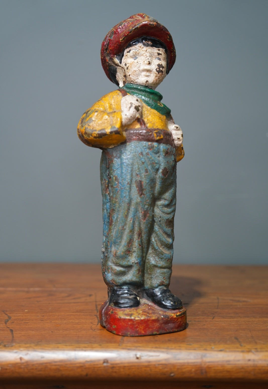 Antique Cast Iron Doorstop Boy Paperboy Vintage Statue RARE