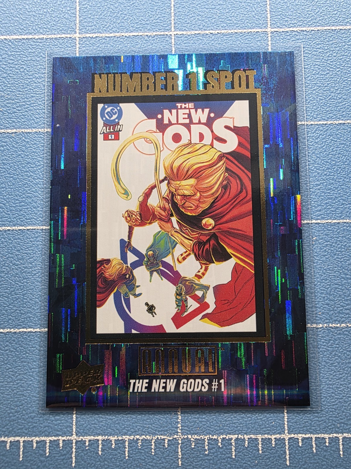 2024-25 UD DC Annual - The New Gods N1S-18 - #1 Spot Retro Wave Parallel 14 / 25
