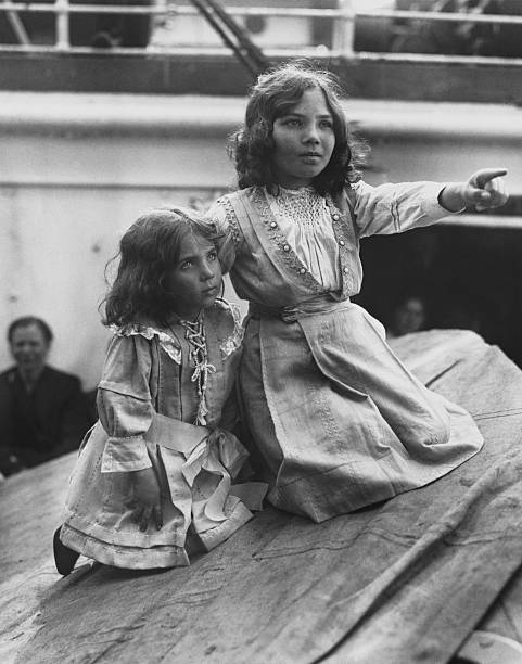 Italian immigrant children aboard ship one girl points out som- 1919 Old Photo