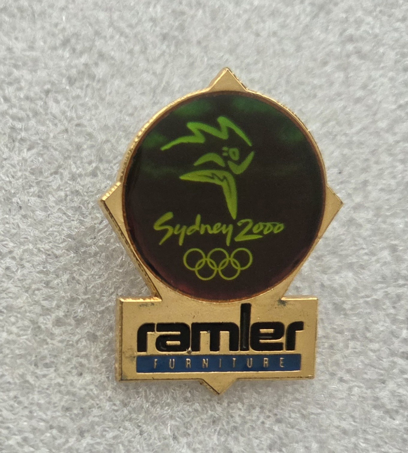 SYDNEY 2000 RAMLER FURNITURE SPONSOR PIN
