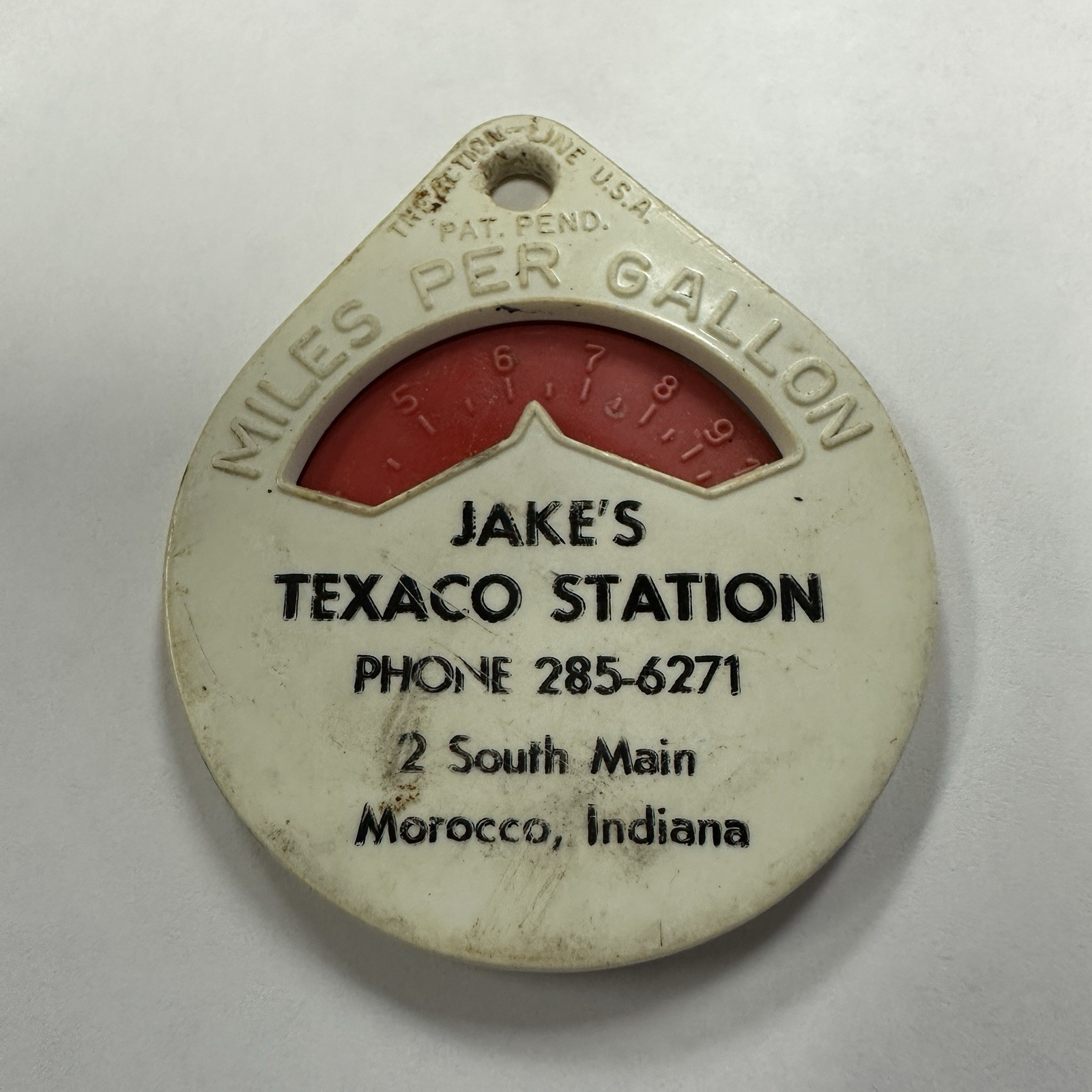 VTG. KEY CHAIN.MILES PER GALLON CALCULATOR Dial FROM Jakes Texaco Station