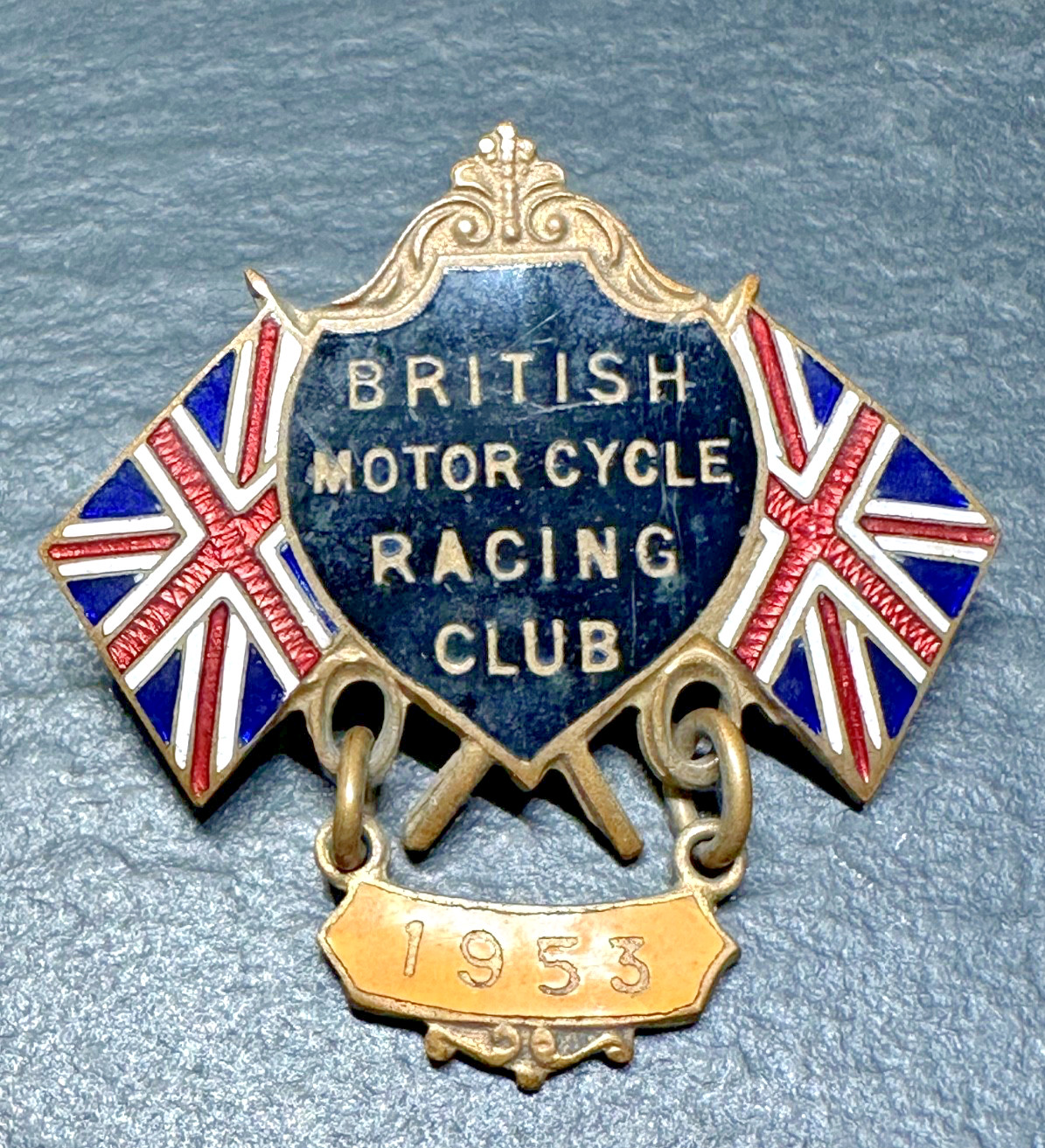 1953 BRITISH MOTOR CYCLE RACING CLUB ENAMEL CLIP WITH FLAGS H519