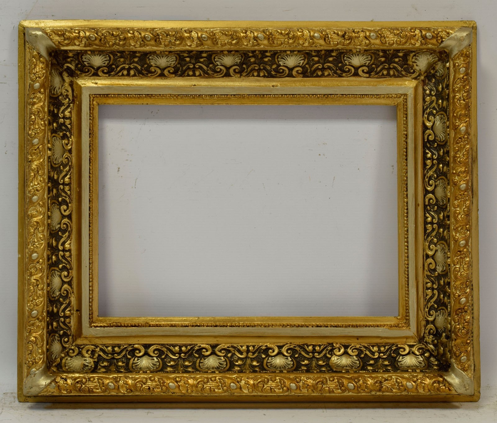 19 c Old frame original condition, covered with metal leaf Internal:16.1x11.8 in