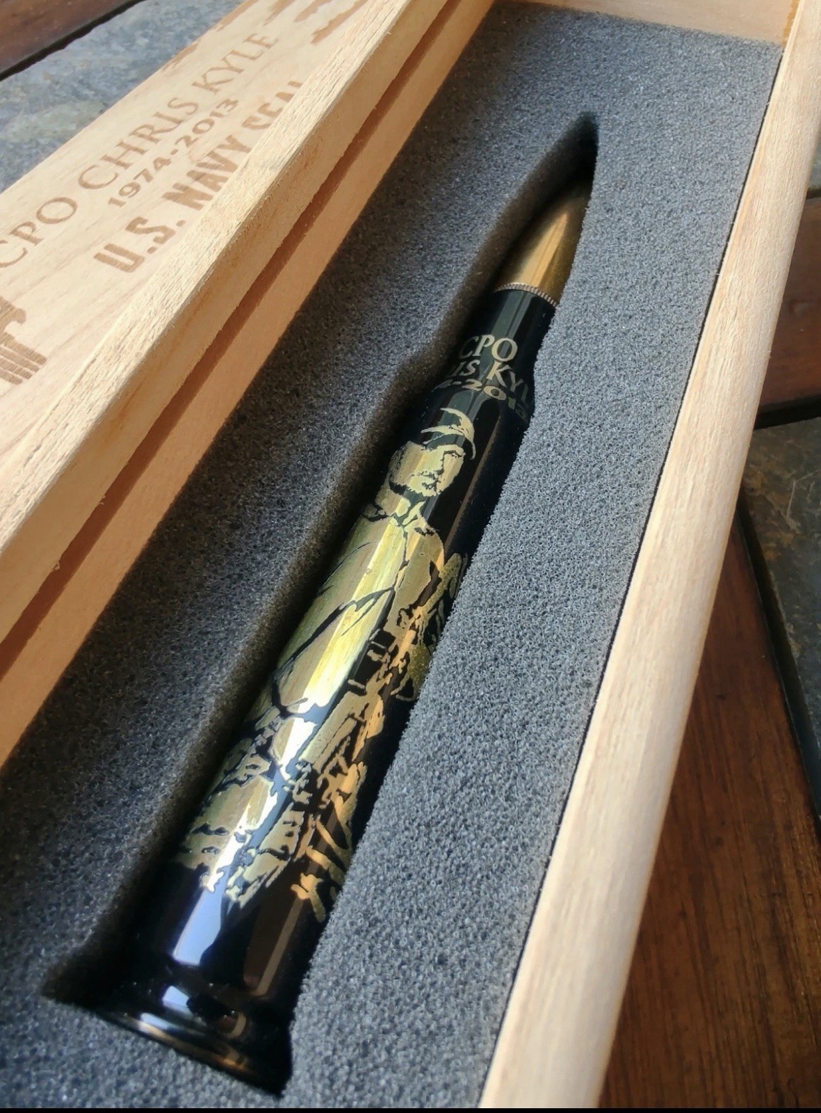 Chris Kyle Commemorative 50 Caliber Shell Bottle Opener in etched wood case