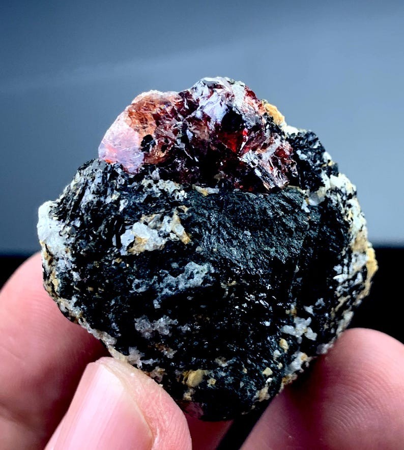 Blood red color zircon crystal specimen from Skardu Pakistani minerals 55 gram