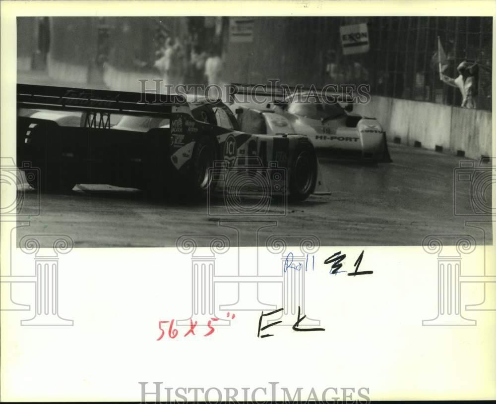 1991 Press Photo Grand Prix du Mardi Gras race cars on a wet course - nos15527