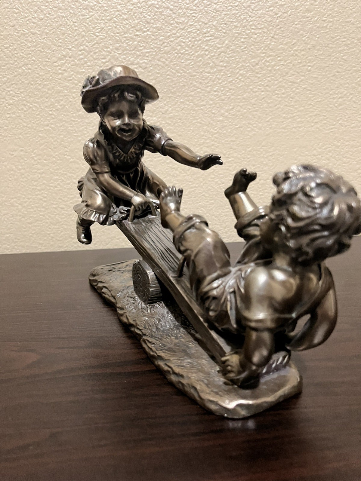 Figurine of Girl and Boy Playing on Seesaw, Cold Cast Bronze Effect Finish