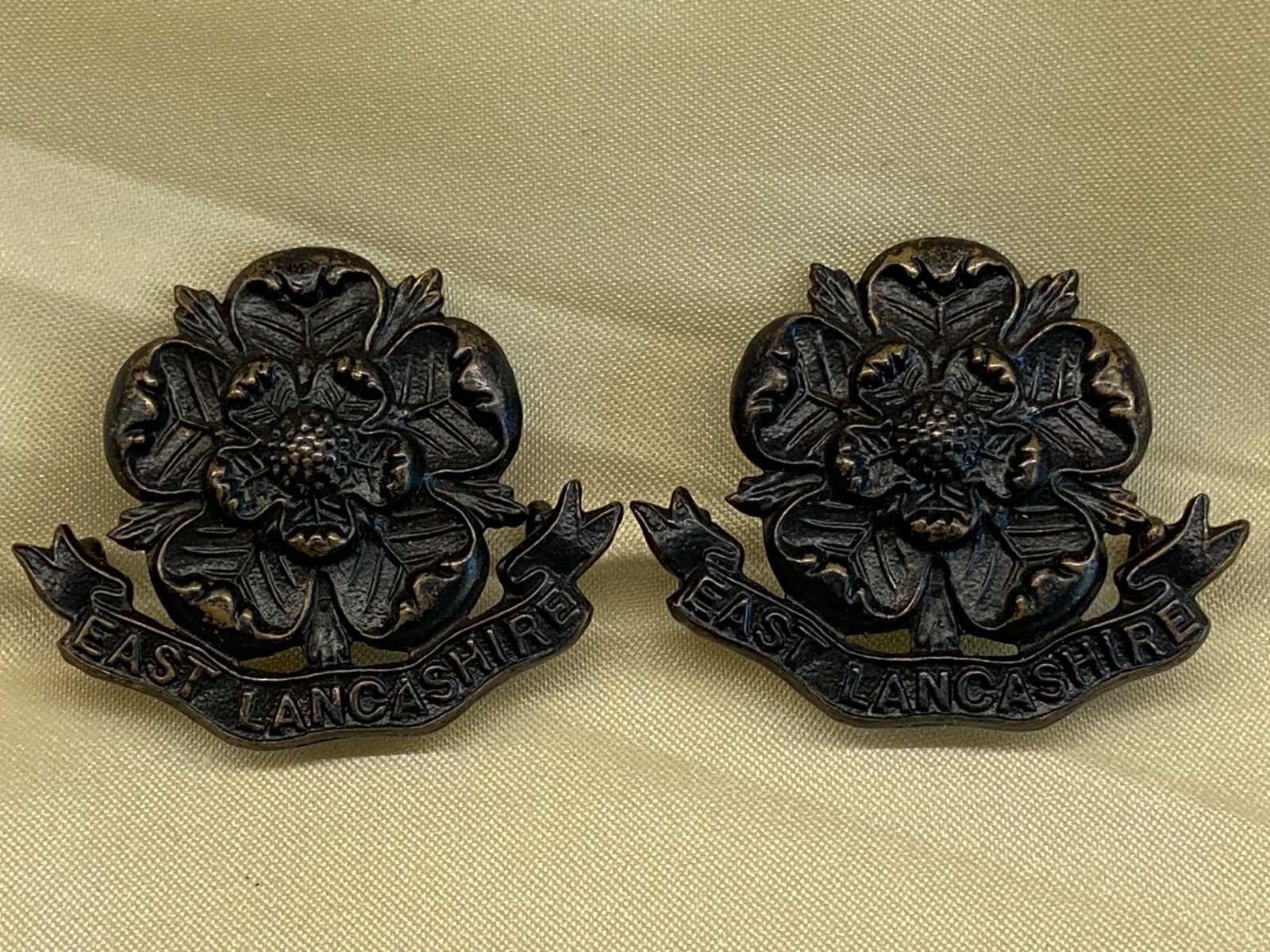 Genuine pair East Lancashire Regiment Officers OSD Collar badges