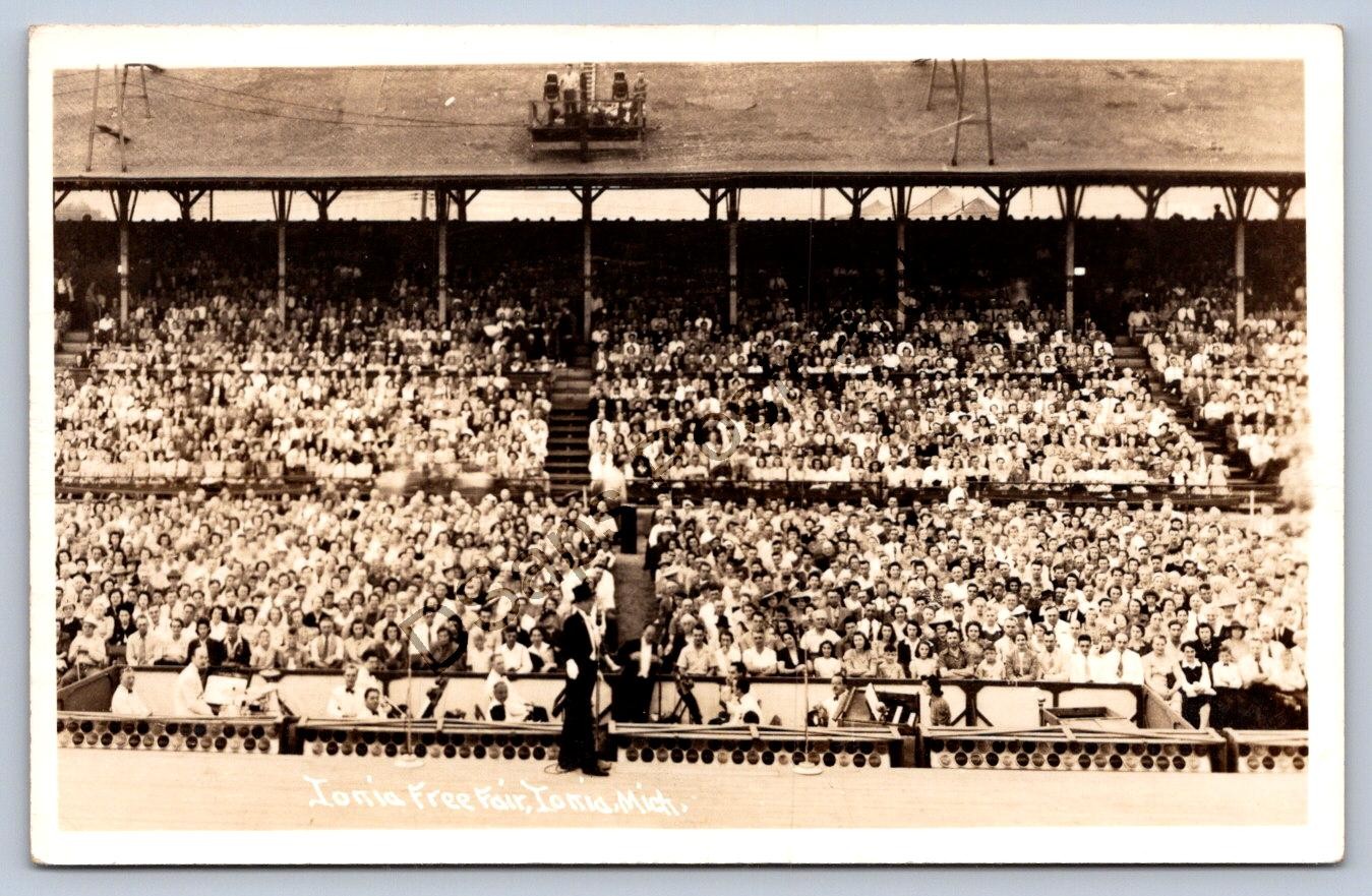 K65/ Ionia Michigan RPPC Postcard c1940s Ionia Free Fair Crowd Band 101