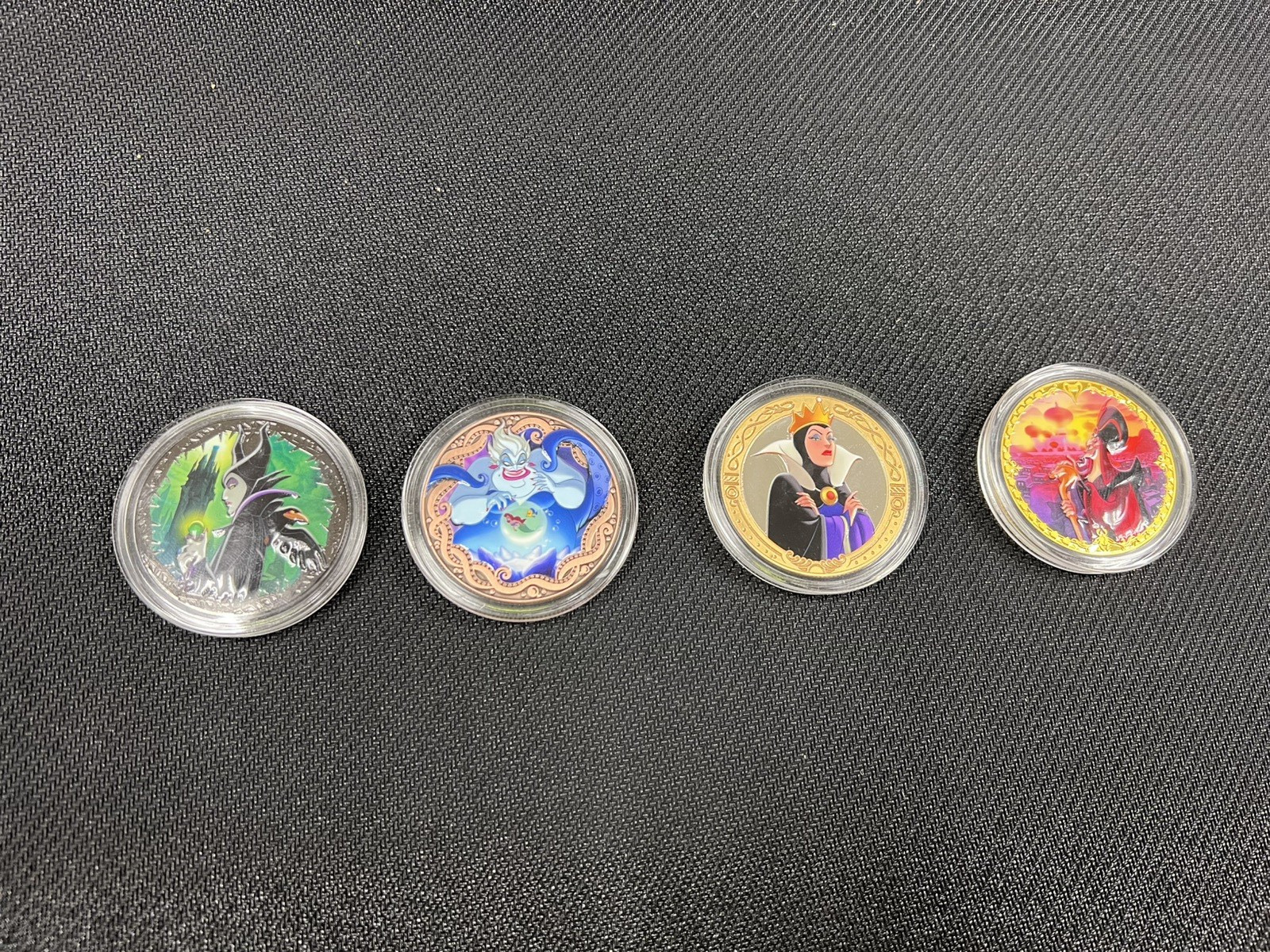 Disneyland Disney Villains Coin Medallions Double Sided Set of 4 New