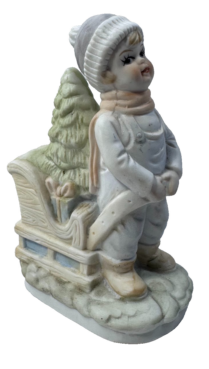 (4A) Vintage Bisque Porcelain Winter Boy Pulling Christmas Sleigh Figurine