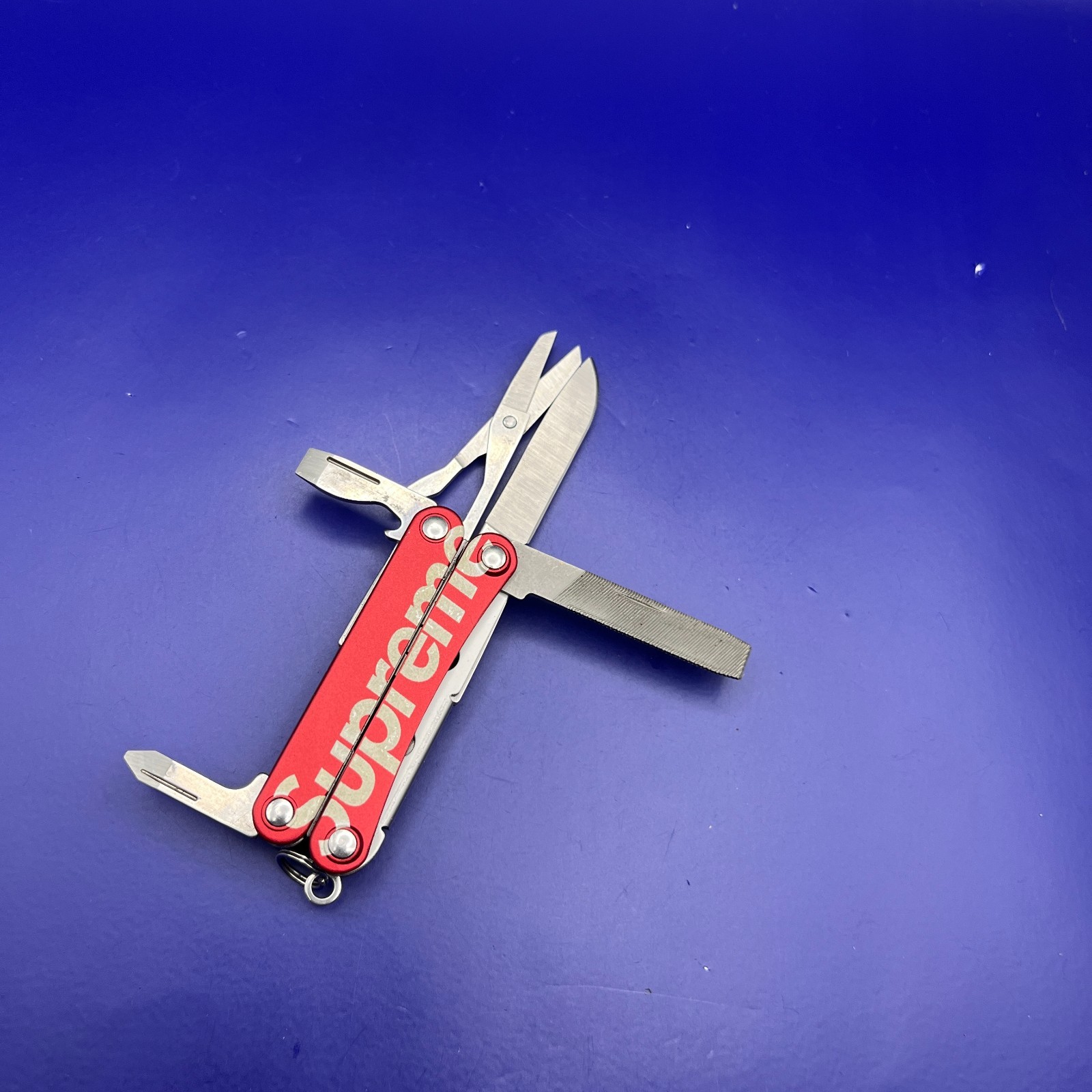 Red Supreme Leatherman Squirt PS4 Multi-Tool Pocket Knife