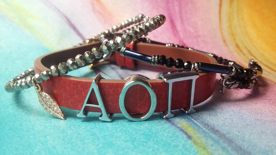 Keep Collective ALPHA OMICRON PI GREEK LETTERS and original red/chestnut Keeper
