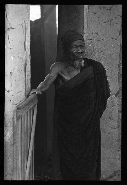 Photo:Nigeria Africa 1900s Elderly Man in Robe at Doorway