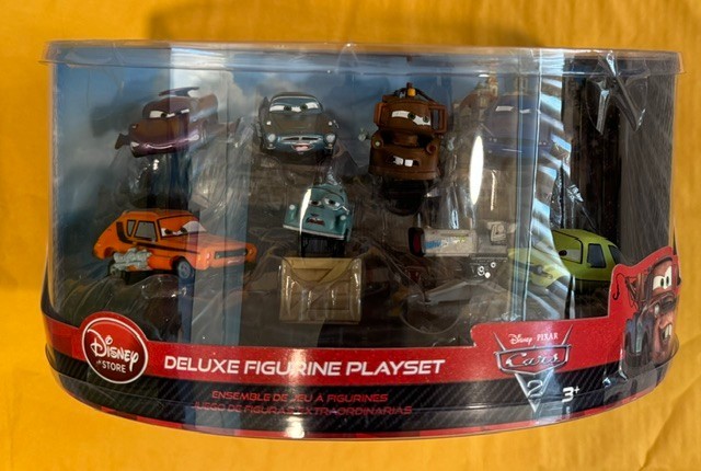 Disney Cars 2 Deluxe 7 Figurine Play Set Mater Finn NEW SEALED Ships FREE in USA