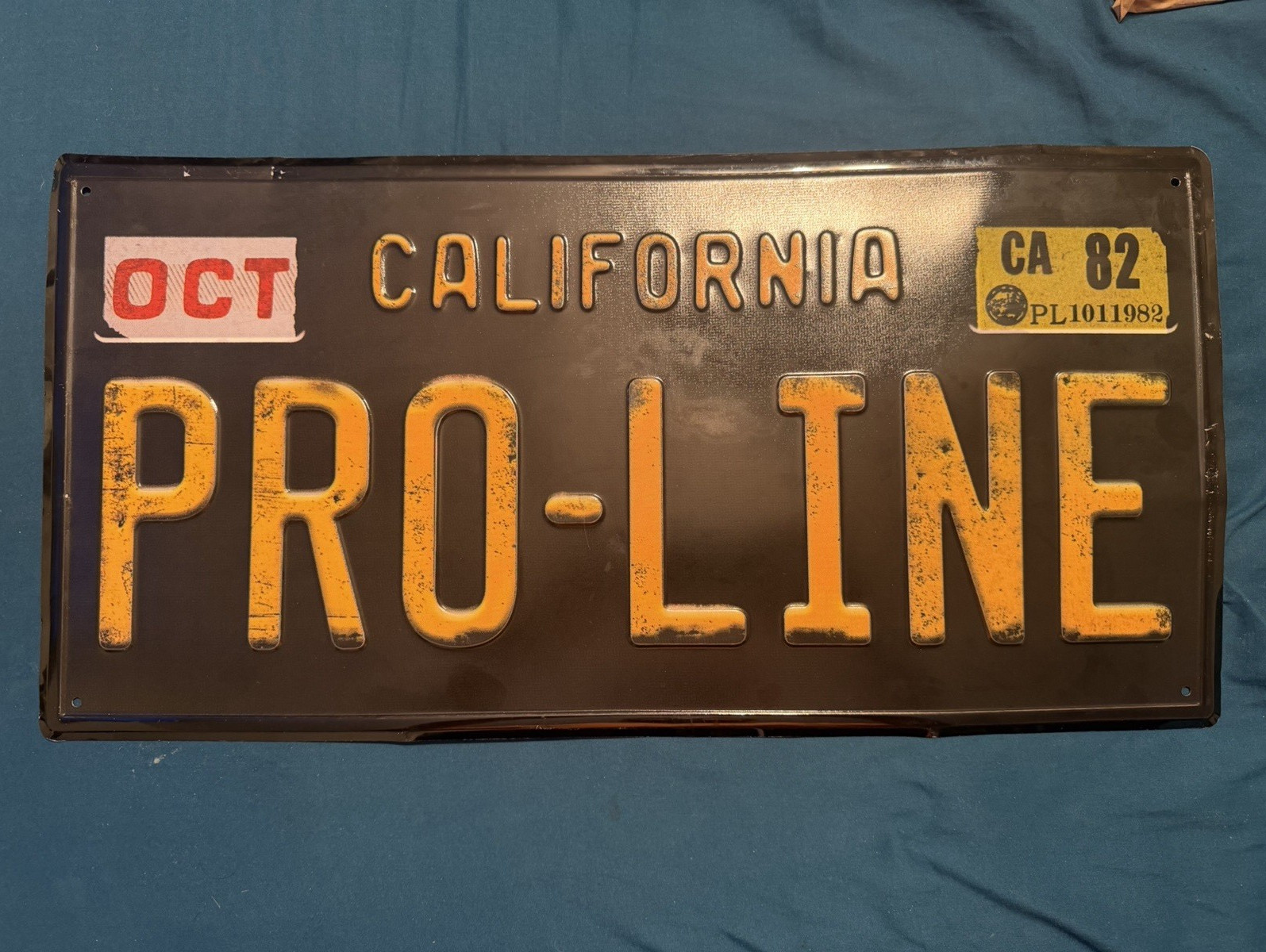 California PRO-LINE 1982 Collectible License Plate Black/Yellow with OCT Sticker