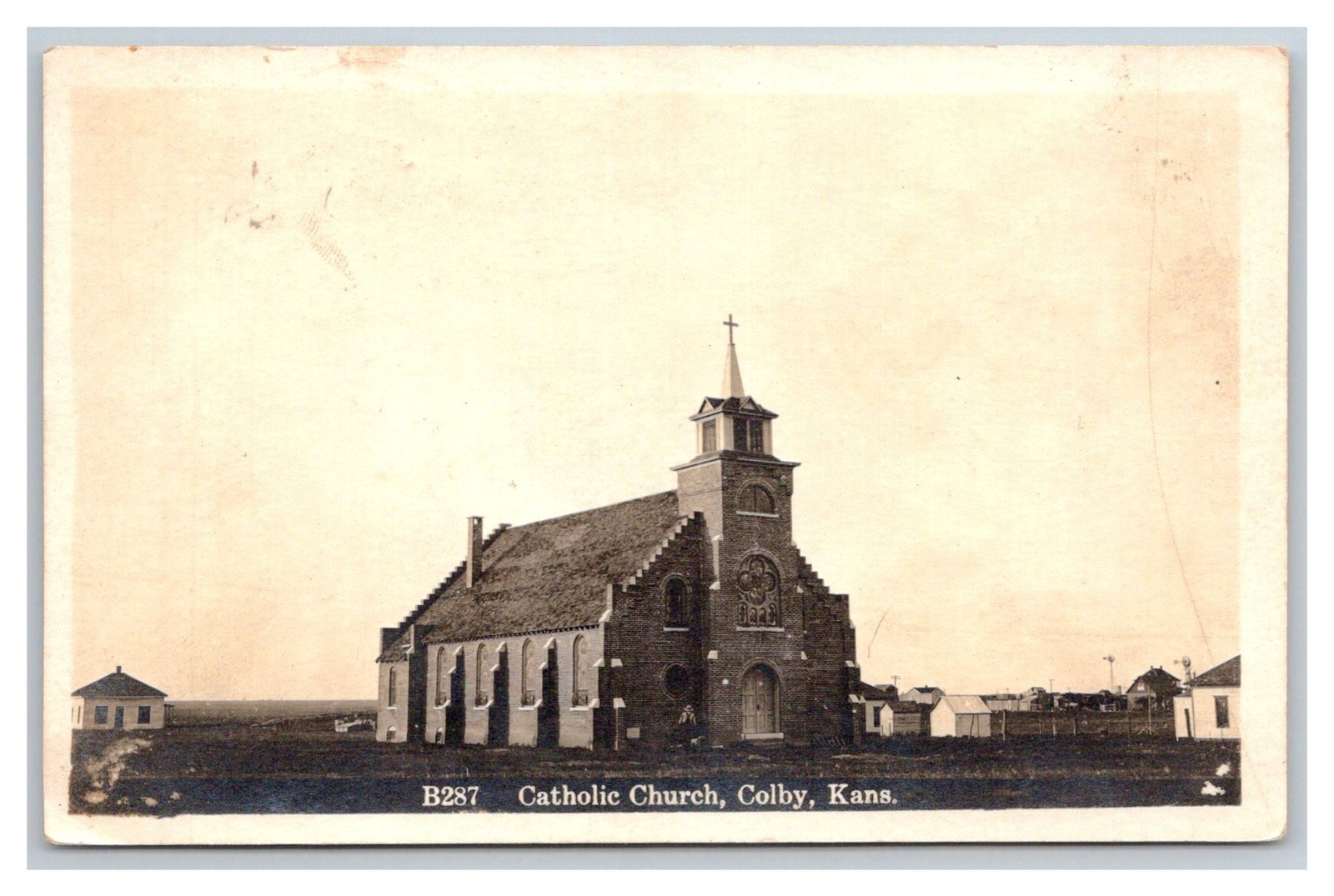 RPPC ~ Colby KS ~ Catholic Church Street view KANSAS