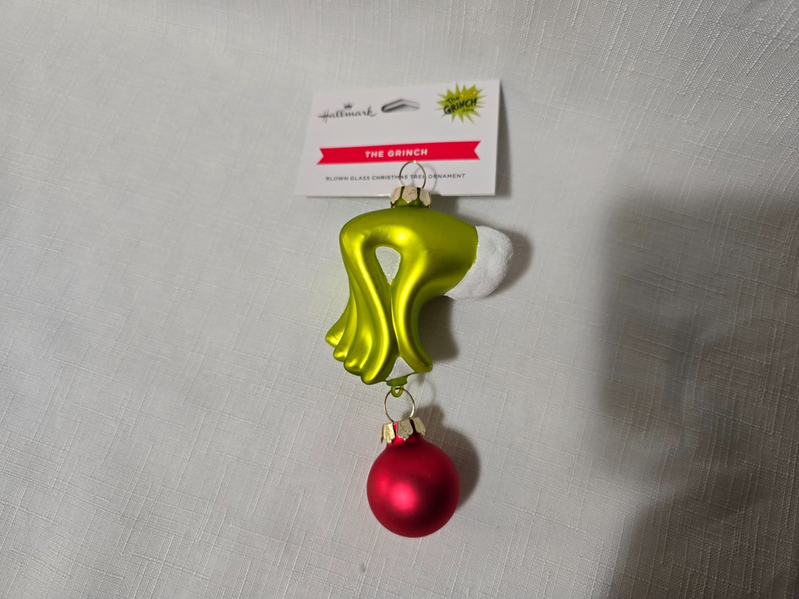 Hallmark The Grinch's Hand Holding Red Ornament - New With Tag
