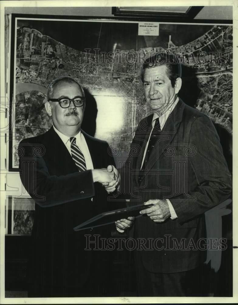 1974 Press Photo New Orleans Port Director E.S. Reed congratulated by J.C. East