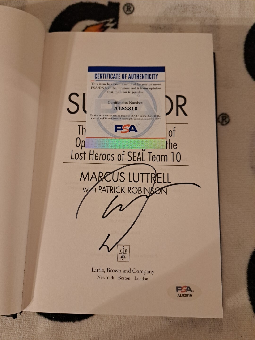 MARCUS LUTTRELL SIGNED BOOK THE LONE SURVIVOR Seal Team 10 HCDJ PSA DNA COA NAVY