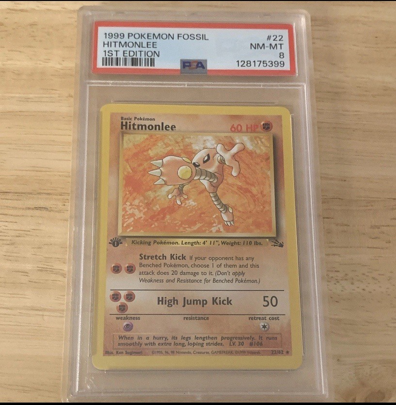 Pokémon Fossil Hitmonlee #22 1st Edition 1999 PSA 8 NM-MT English