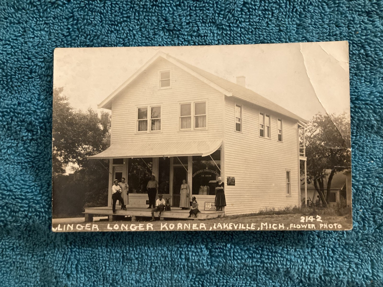 RPPC Lakeville Michigan Linder Longer Korner Store Flower Photo Posted 1922