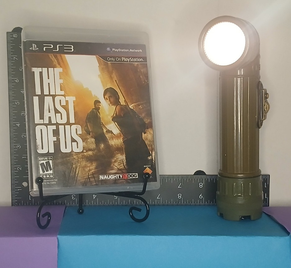 The Last of Us PS3 + Fulton MX‑991/U Military Flashlight Bundle Tested Complete