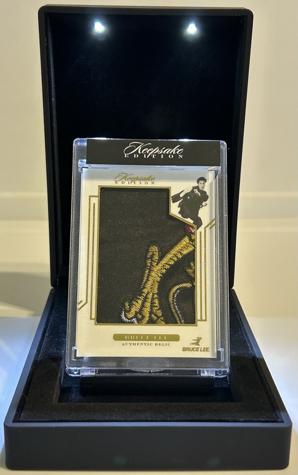 2024 Keepsake Bruce Lee 50th Anniversary #78 Authentic Relic #/50 with display