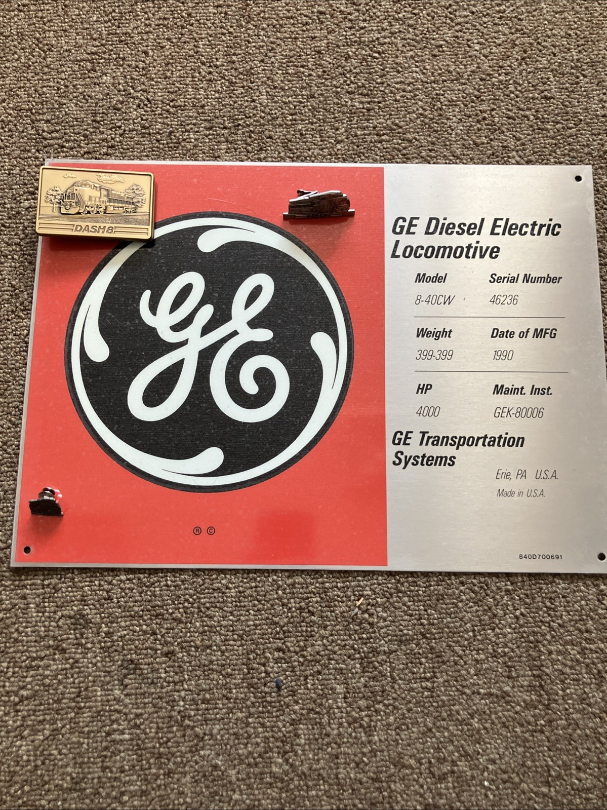 Vintage GE Dash-8 Memorabilia (Builder's Plate, Belt Buckle, Tie Clip, Pin)