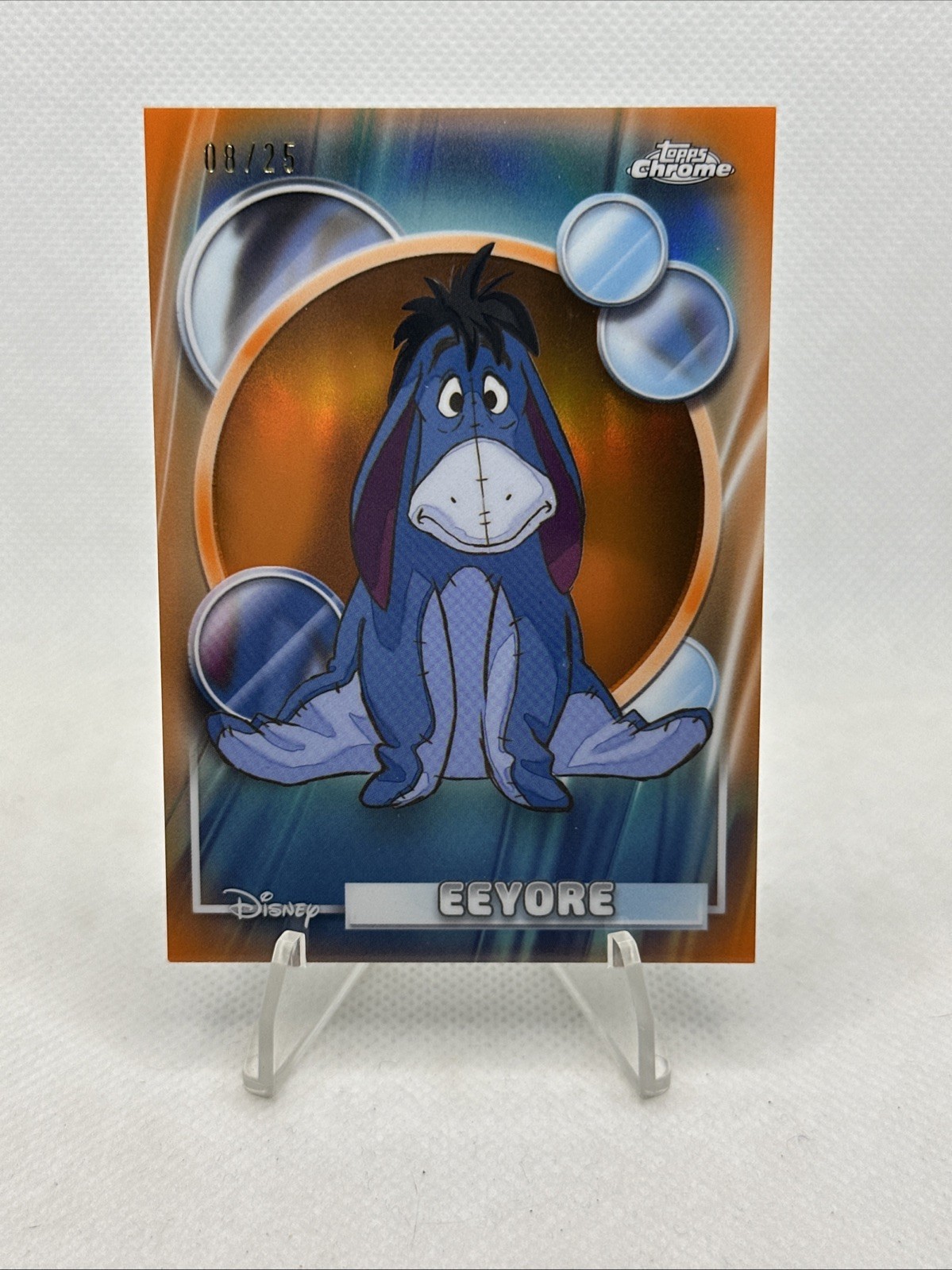 2026 Topps Chrome Disney #102 Eeyore /25 (Orange Refractor)