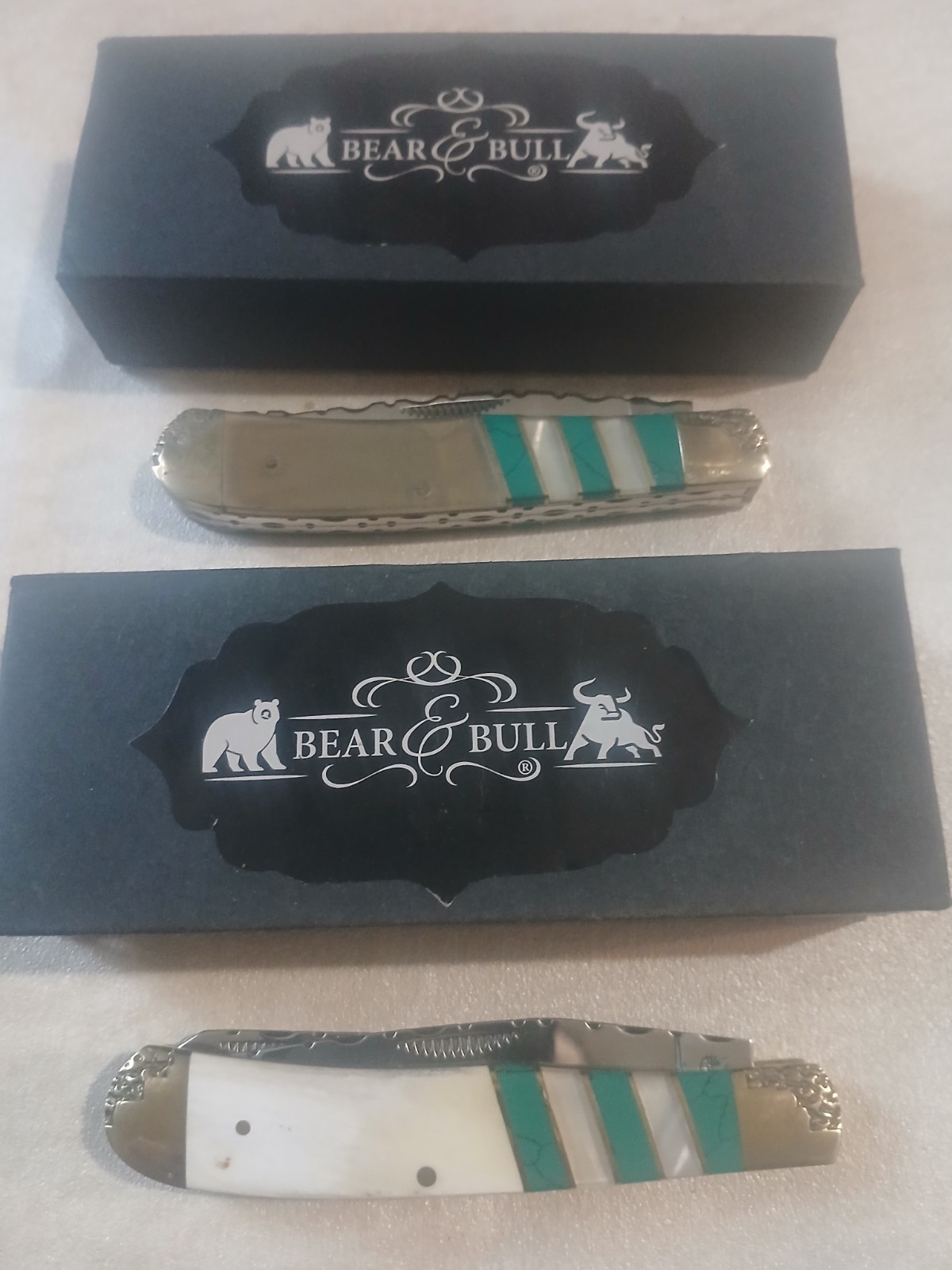 2pc Bear and Bull Cutlery Ox Horn Trapper. New With Box 