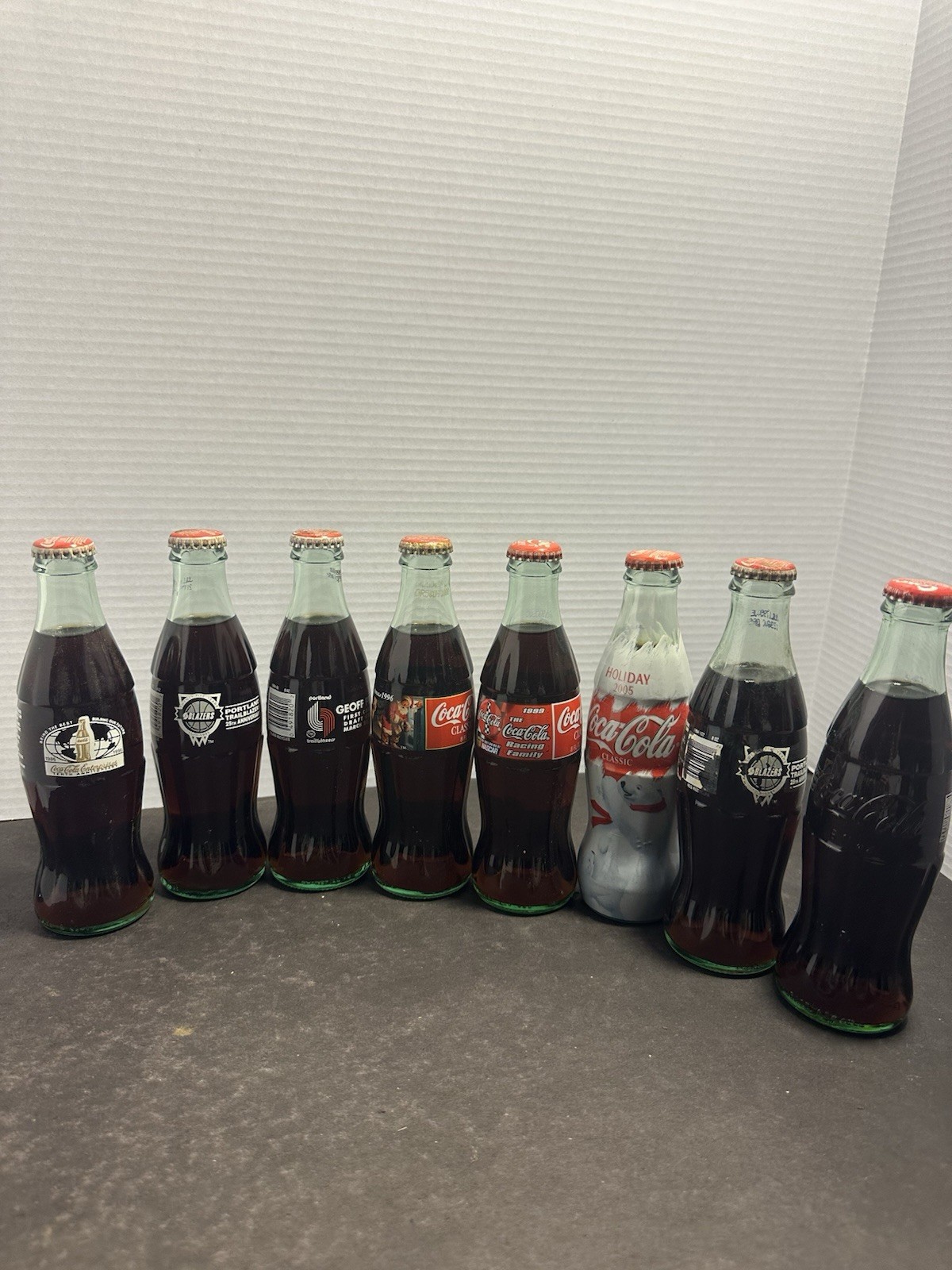 8 Vintage Coca-Cola Full Unopened Bottles Blazers NASCAR Holiday Collectible