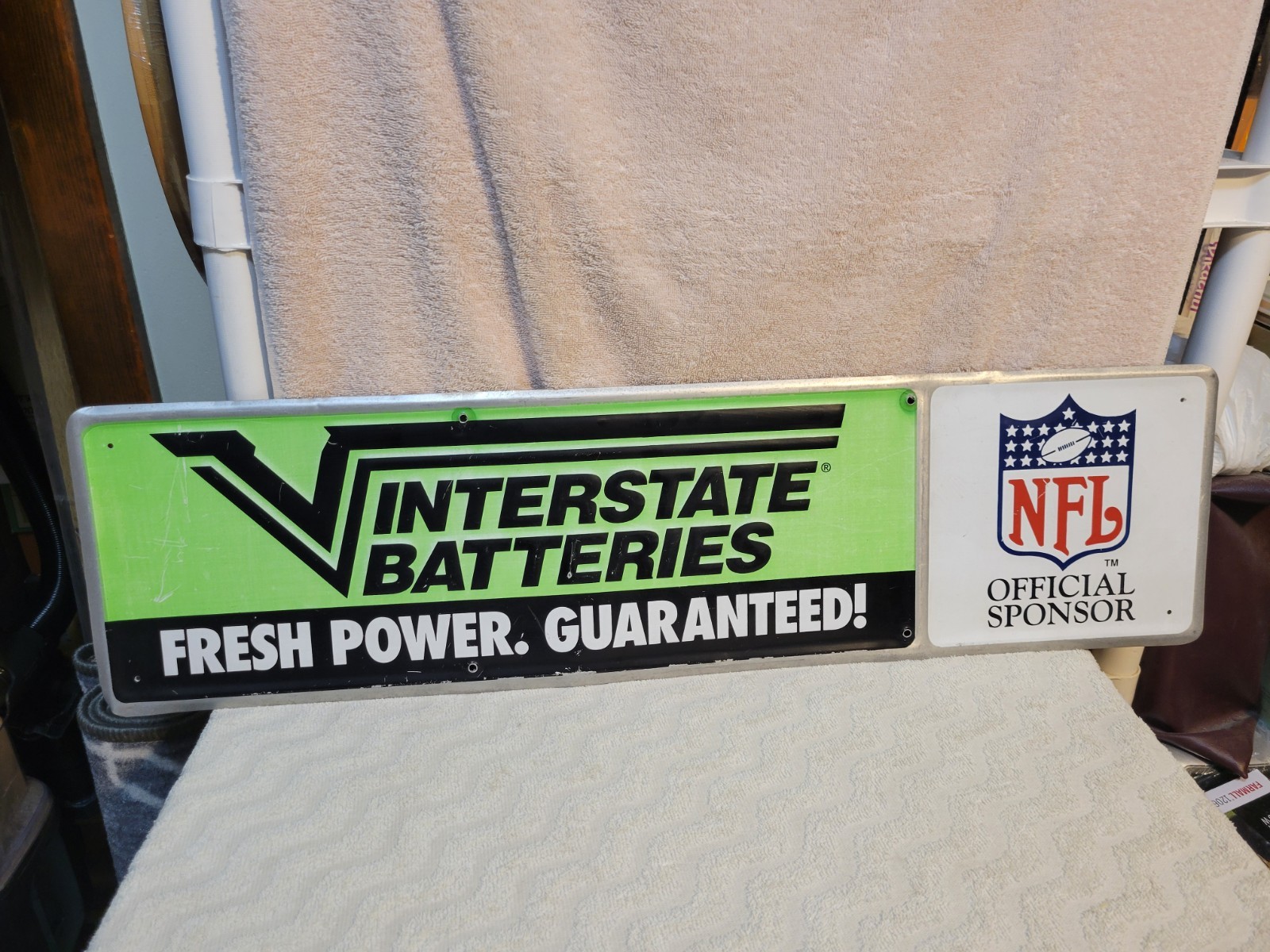 VINTAGE INTERSTATE BATTERIES NFL OFFICIAL SPONSOR SIGN 30 X 8 IN. 