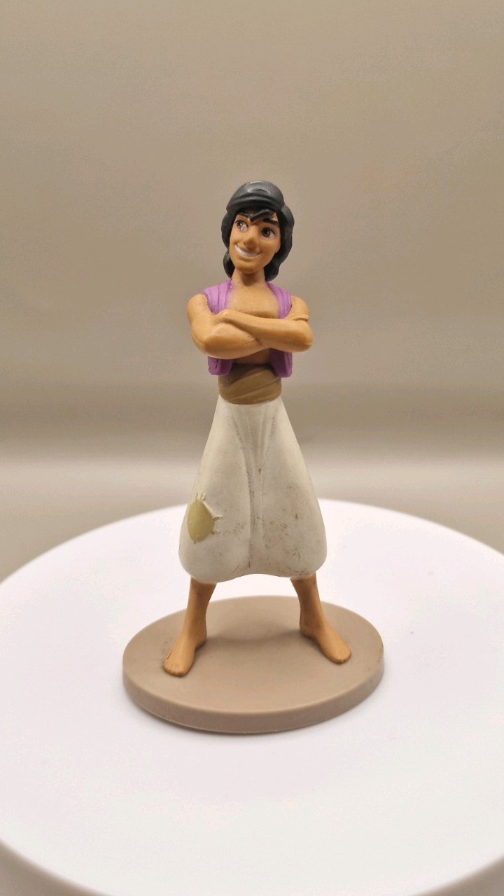 DISNEY STORE FIGURE 4\