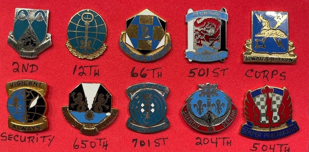 Collection of 10 US Army Military Intelligence Battalion Unit Crest Pins 